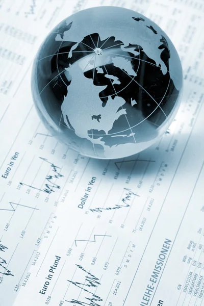 Globe on business documents — Stock Photo, Image