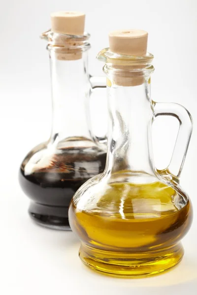 Oil and vinegar bottles — Stock Photo, Image