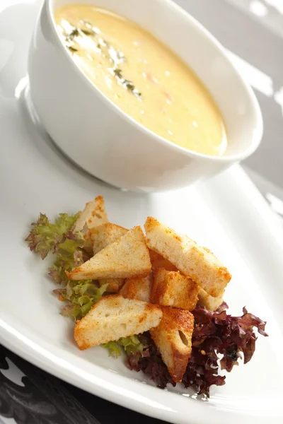 Cream soup with toasts — Stock Photo, Image