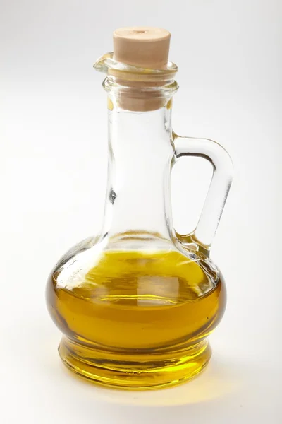 Olivenolie i flasken - Stock-foto