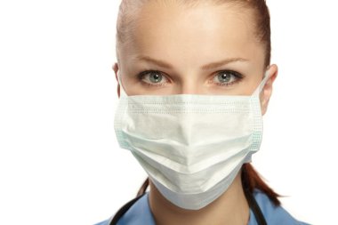 Medical doctor in the surgeon's mask clipart
