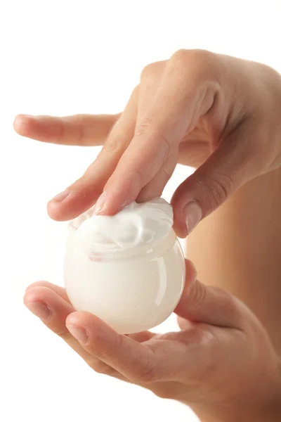 stock image Woman applying cream on her hand