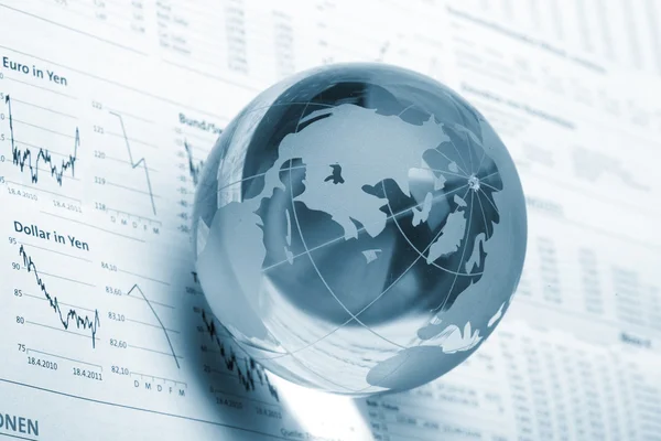 Globe on business documents — Stock Photo, Image