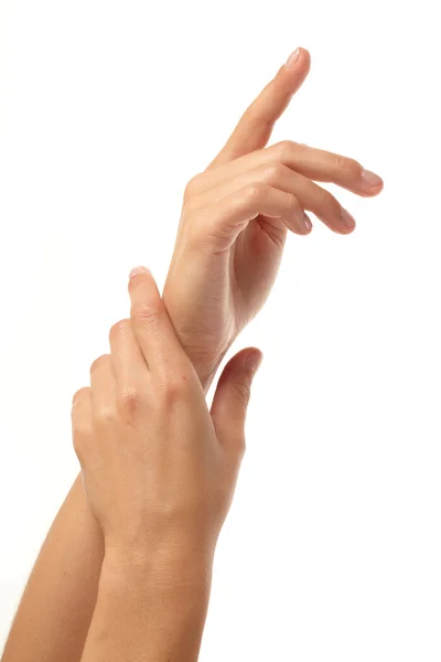 Kvinna applicera grädde på händerna — Stockfoto