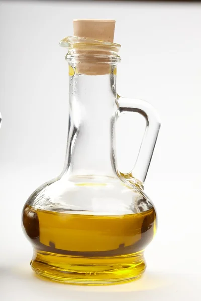 Olivenolie i flasken - Stock-foto