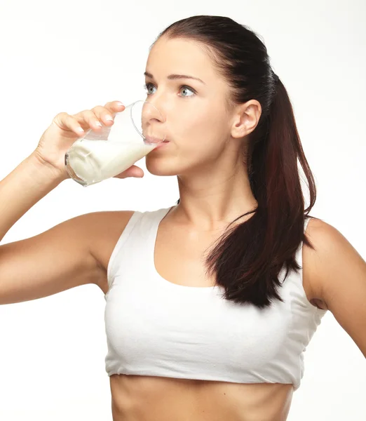 Young woman with glass of milk — Stock Photo, Image