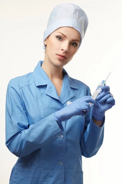 Medical doctor with syringe — Stock Photo, Image