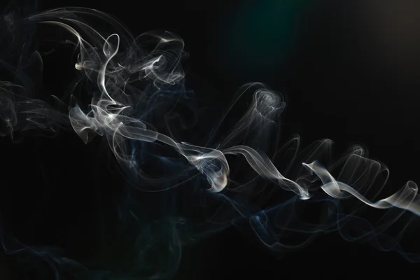 stock image Smoke on the black background