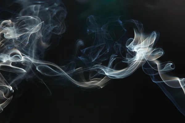 stock image Smoke on the black background