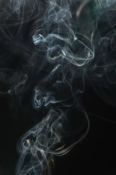 stock image Smoke on the black background