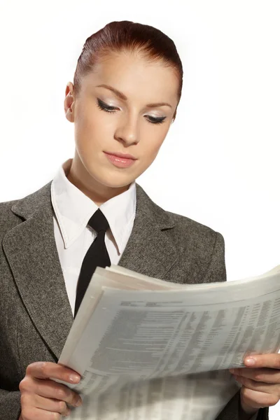 Businesswoman with newspaper — Stock Photo, Image