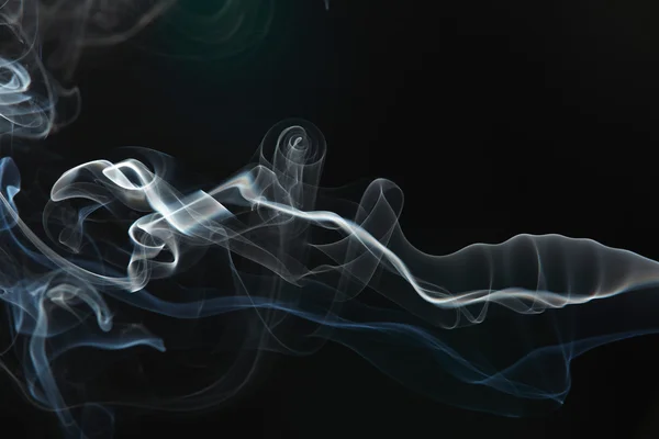 Stock image Smoke on the black background