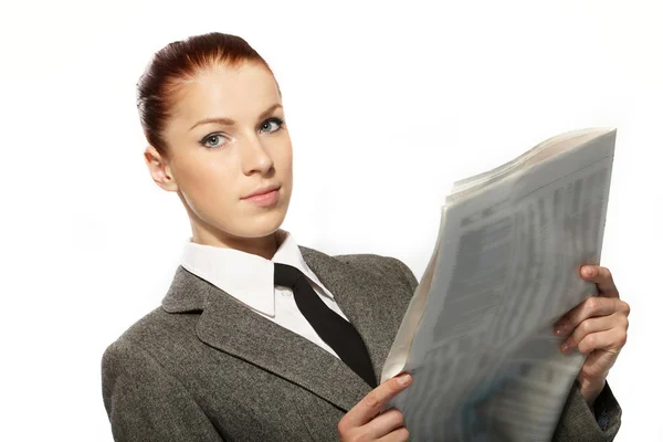 Businesswoman with newspaper — Stock Photo, Image