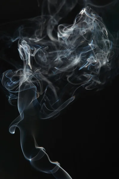 stock image Smoke on the black background