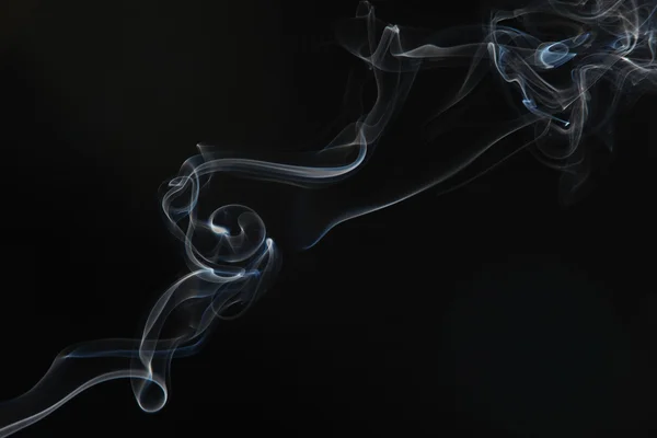 stock image Smoke on the black background