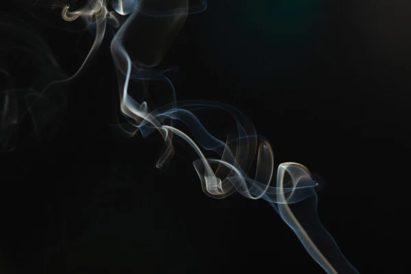 stock image Smoke on the black background