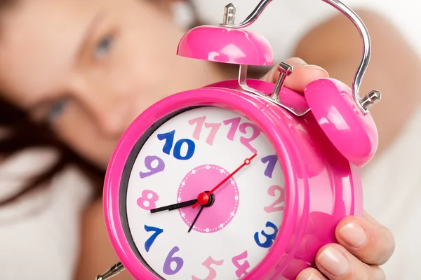 Beautiful woman and alarm clock — Stock Photo, Image