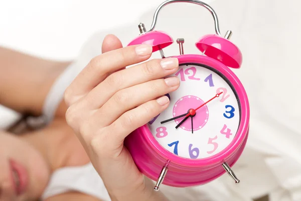 stock image Beautiful woman and alarm clock