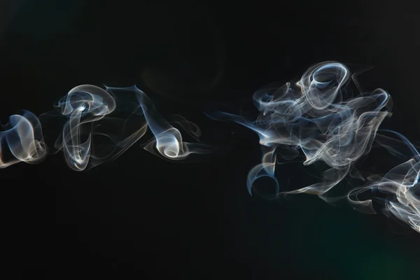 stock image Smoke on the black background