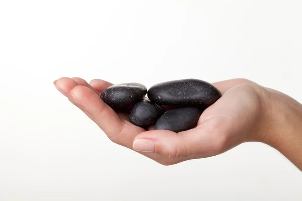 Stenen op een hand — Stockfoto