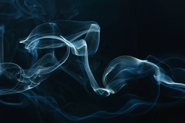 Smoke on the black background — Stock Photo, Image