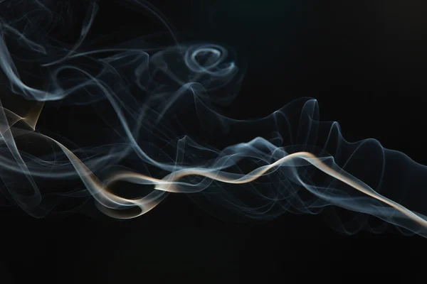 stock image Smoke on the black background