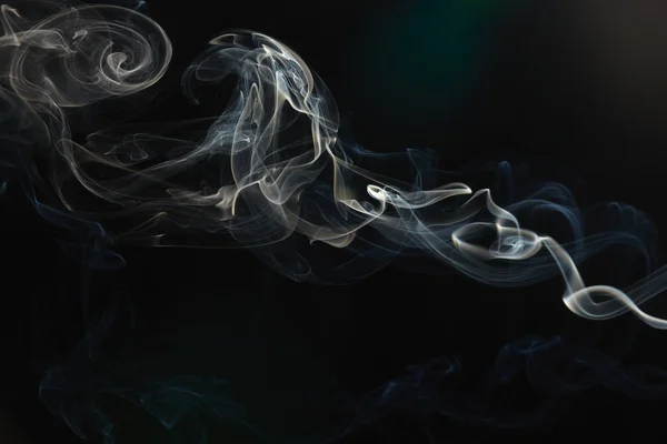 stock image Smoke on the black background