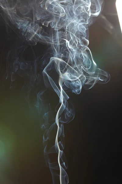 stock image Smoke on the black background