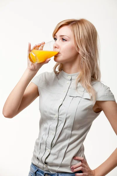 Young woman with orange juice — Stok fotoğraf