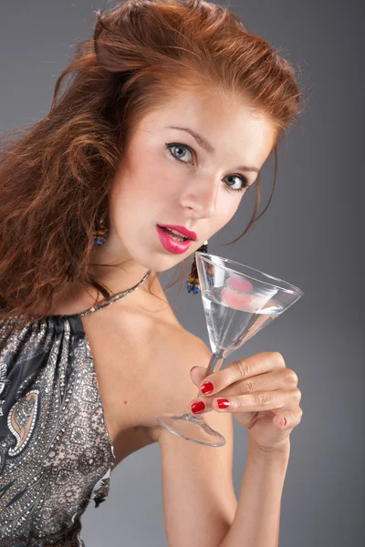 Beautiful woman with a cocktail — Stock Photo, Image