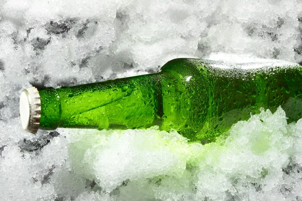 Close up view of the bottle in ice — Stock Photo, Image