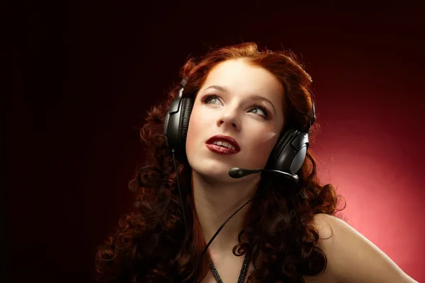 Mooie vrouwen met een headset — Stockfoto