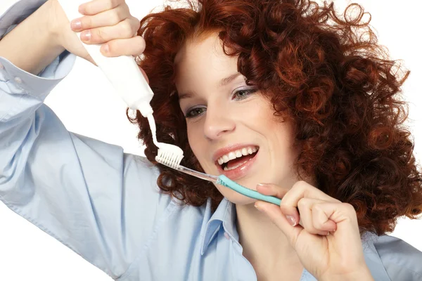 Schoonheid van de jonge vrouw schone tanden — Stockfoto