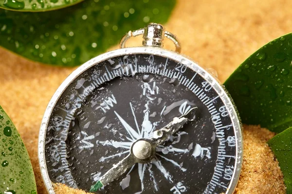 Wet compass in sand — Stock Photo, Image
