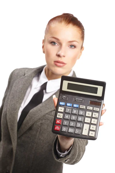 Portrait of young businesswoman with calculator — Stock Photo, Image