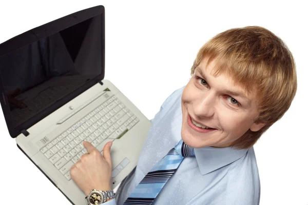 Junger Mann mit Laptop — Stockfoto