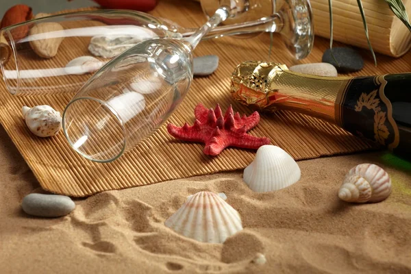 Champagne sparkling on a beach — Stock Photo, Image