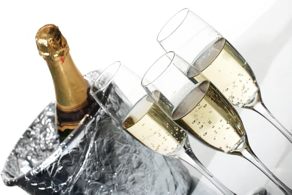 Champagne flutes and ice bucket — Stock Photo, Image