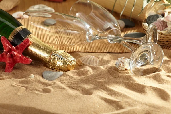 stock image Champagne sparkling on a beach