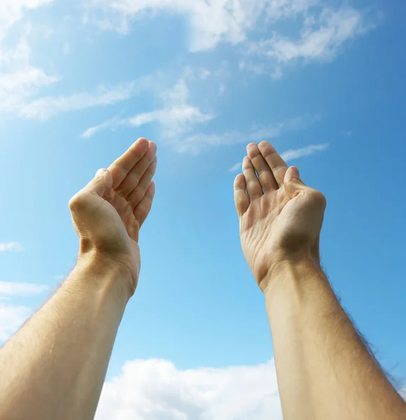 Hands stretched to the sky — Stock Photo, Image