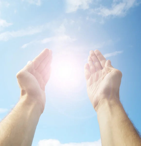 Hands stretched to the sky — Stock Photo, Image