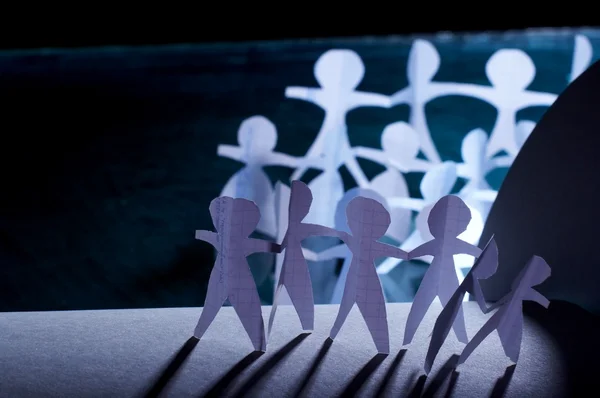 stock image Crowd of paper keeping for hands