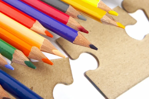 Color pencils, puzzle — Stock Photo, Image