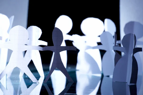 stock image Crowd of paper keeping for hands