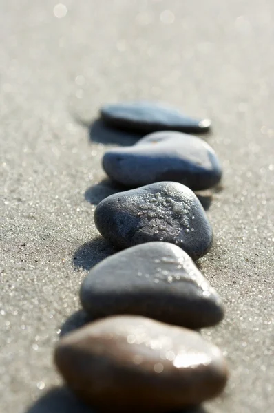 Kövek, tengeren egy kavicsos homok — Stock Fotó