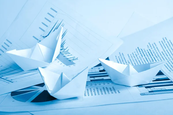 Business concept, paper boat e documenti — Foto Stock