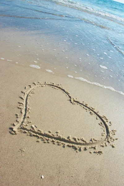 stock image Heart drawn on sand, seacoast