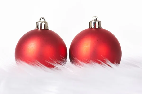 Red christmas balls with snow — Stock Photo, Image