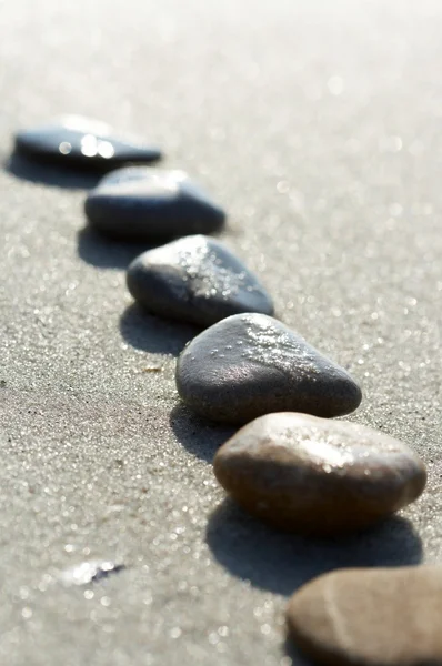 stock image Stones on sand at the sea, a pebble