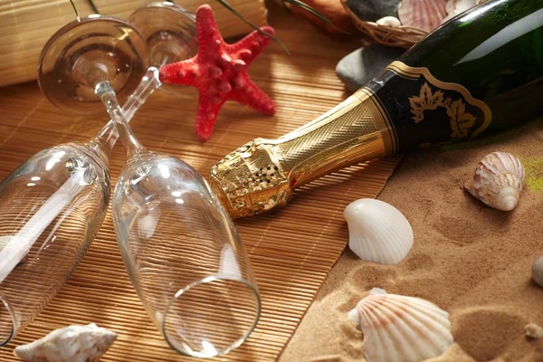 stock image Champagne sparkling on a beach